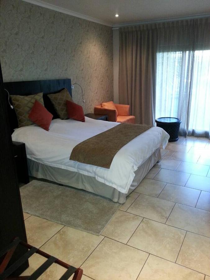 Planet Hotel Hollybum Lubumbashi Extérieur photo